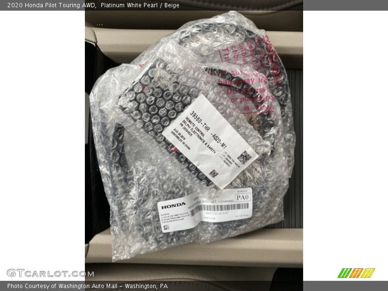 Platinum White Pearl / Beige 2020 Honda Pilot Touring AWD