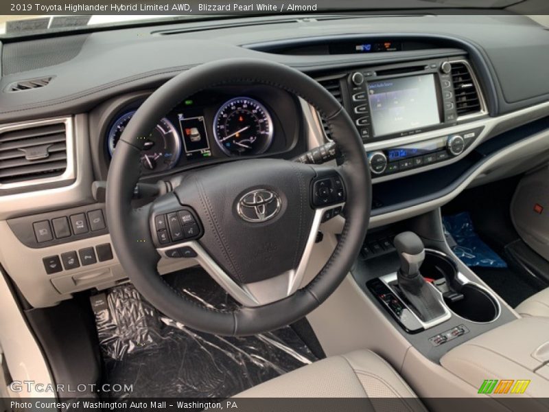 Blizzard Pearl White / Almond 2019 Toyota Highlander Hybrid Limited AWD