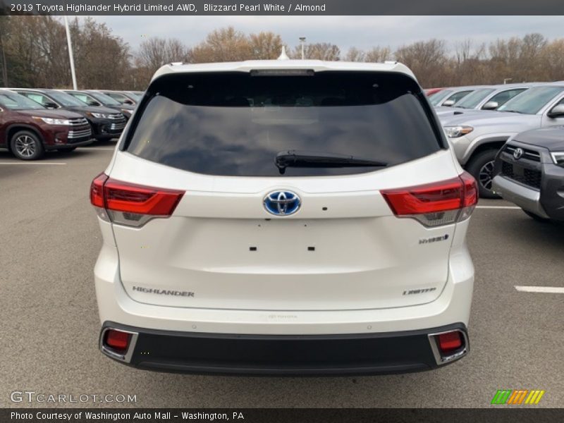 Blizzard Pearl White / Almond 2019 Toyota Highlander Hybrid Limited AWD
