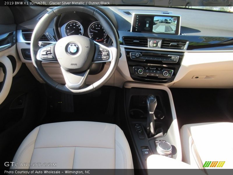 Glacier Silver Metallic / Oyster/Black 2019 BMW X1 sDrive28i