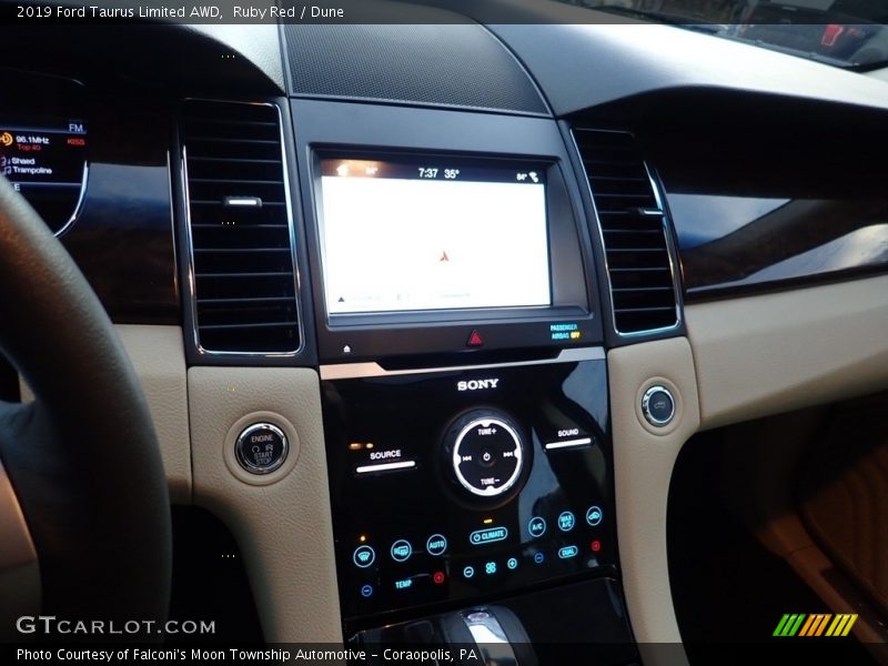 Ruby Red / Dune 2019 Ford Taurus Limited AWD