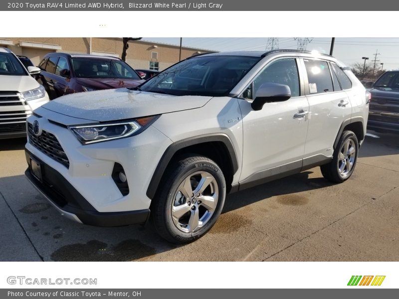 Blizzard White Pearl / Light Gray 2020 Toyota RAV4 Limited AWD Hybrid