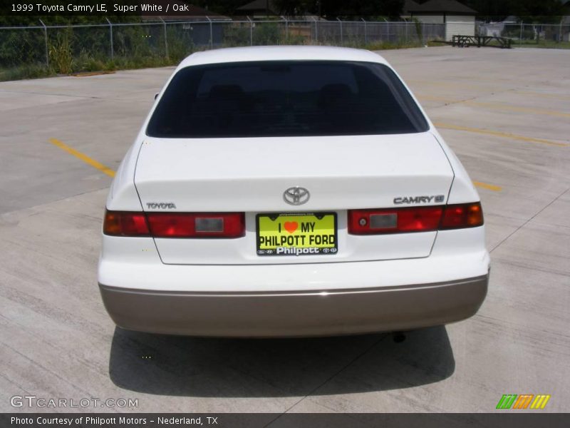 Super White / Oak 1999 Toyota Camry LE