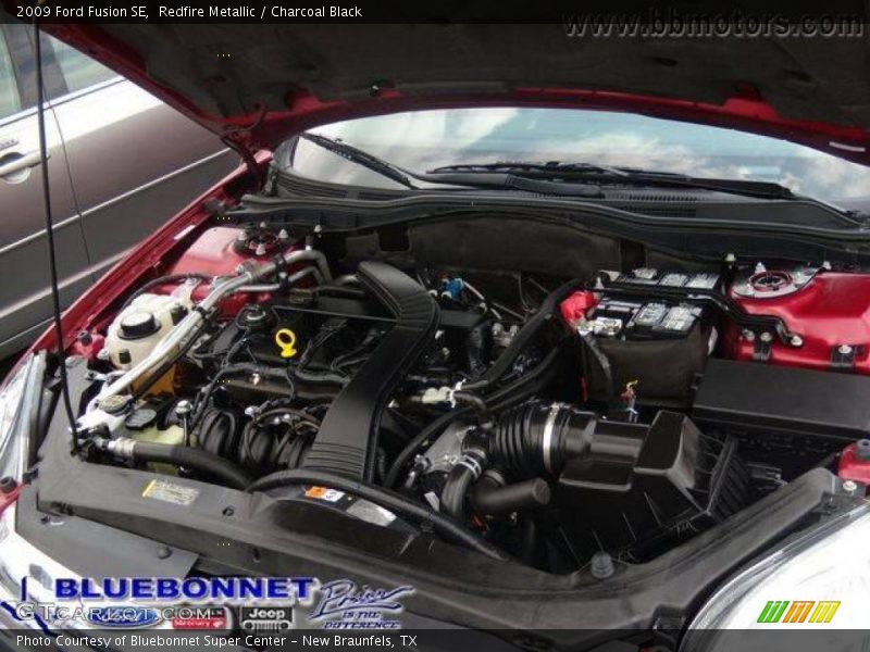 Redfire Metallic / Charcoal Black 2009 Ford Fusion SE