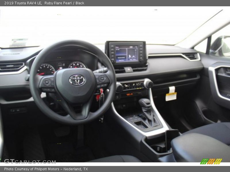 Ruby Flare Pearl / Black 2019 Toyota RAV4 LE
