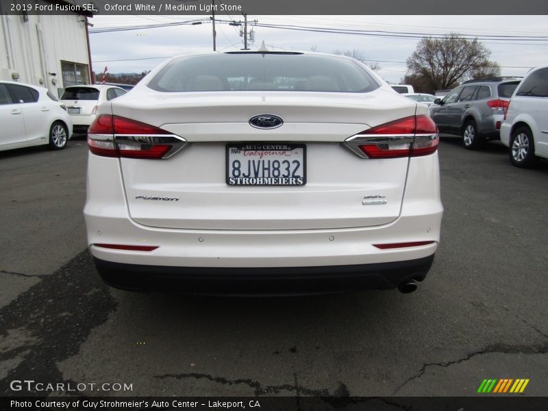 Oxford White / Medium Light Stone 2019 Ford Fusion SEL