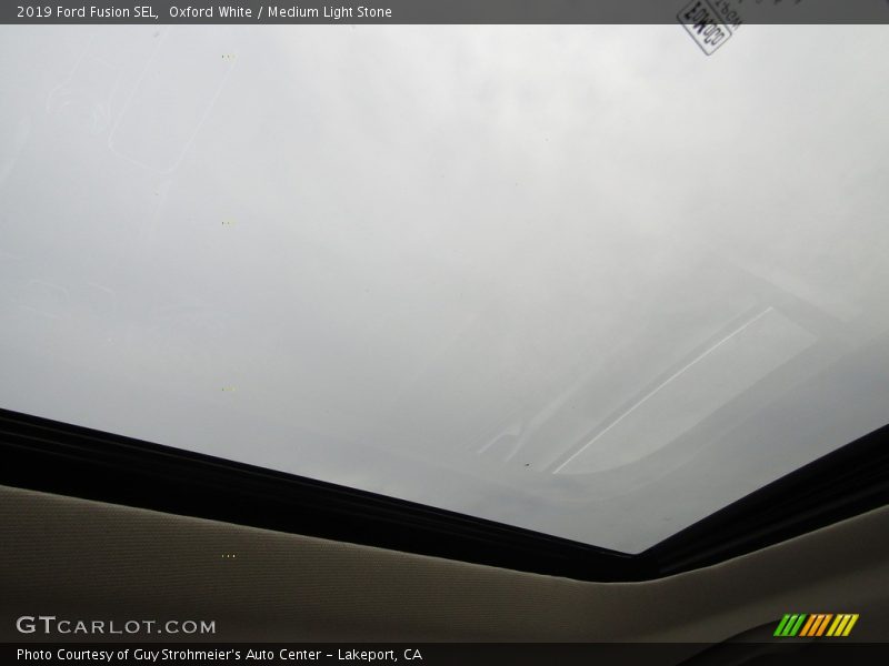 Oxford White / Medium Light Stone 2019 Ford Fusion SEL