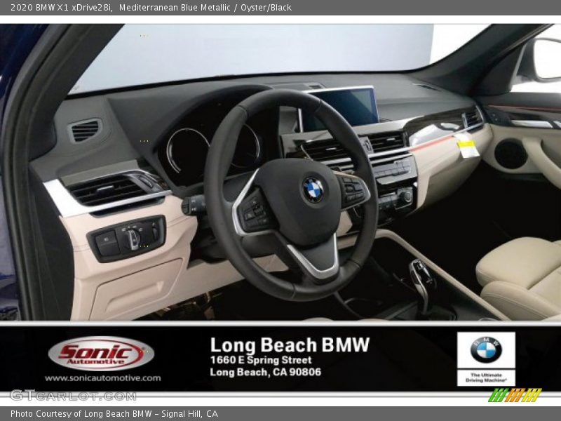 Mediterranean Blue Metallic / Oyster/Black 2020 BMW X1 xDrive28i