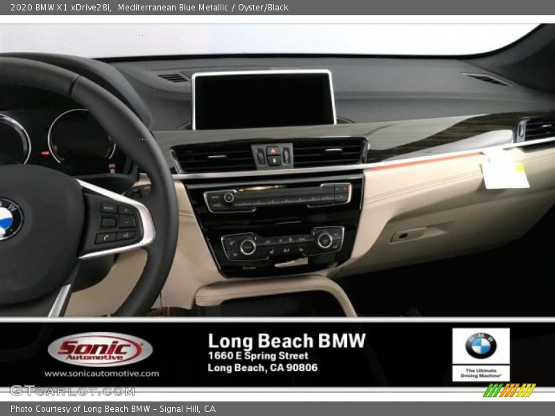 Mediterranean Blue Metallic / Oyster/Black 2020 BMW X1 xDrive28i