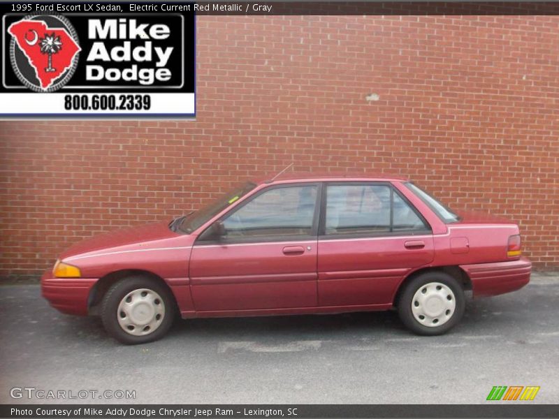 Electric Current Red Metallic / Gray 1995 Ford Escort LX Sedan