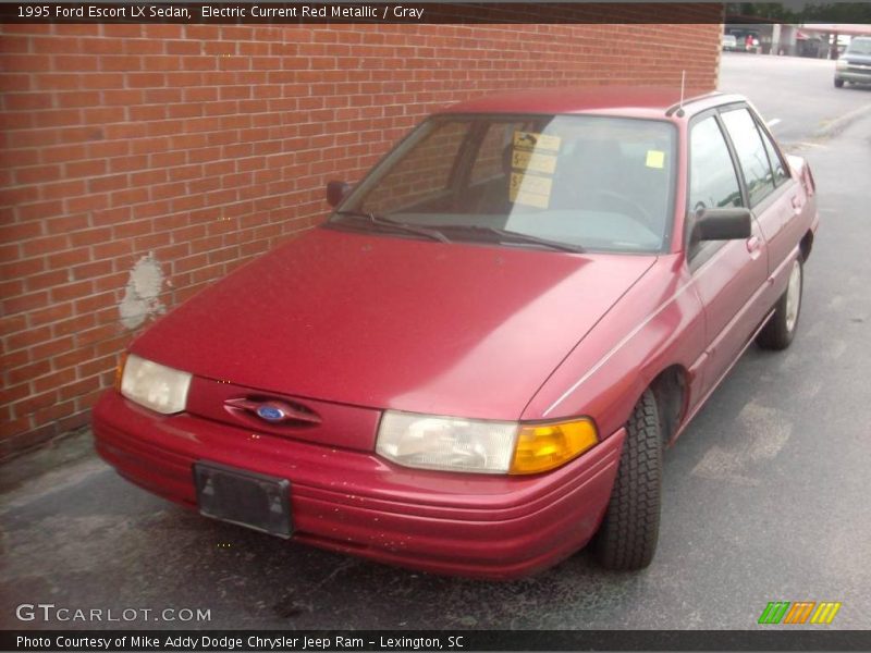 Electric Current Red Metallic / Gray 1995 Ford Escort LX Sedan