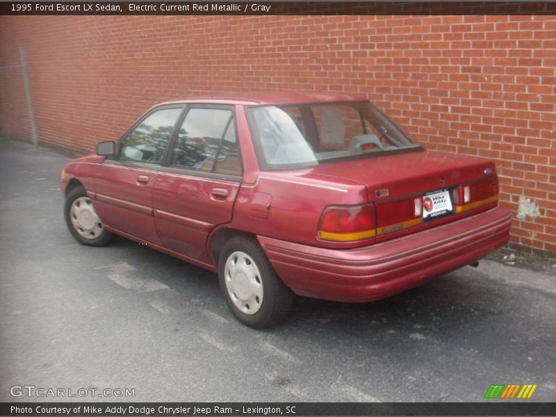 Electric Current Red Metallic / Gray 1995 Ford Escort LX Sedan