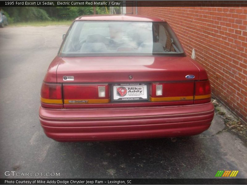Electric Current Red Metallic / Gray 1995 Ford Escort LX Sedan