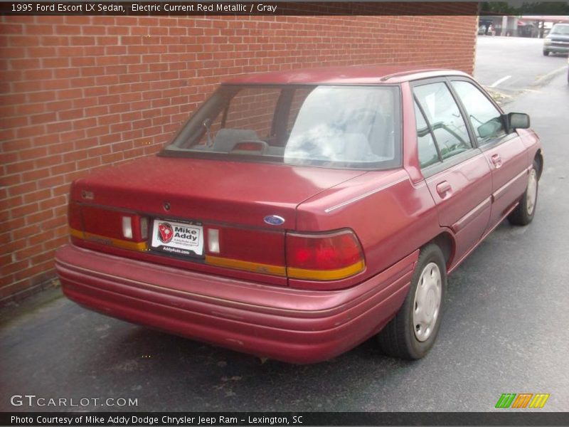 Electric Current Red Metallic / Gray 1995 Ford Escort LX Sedan