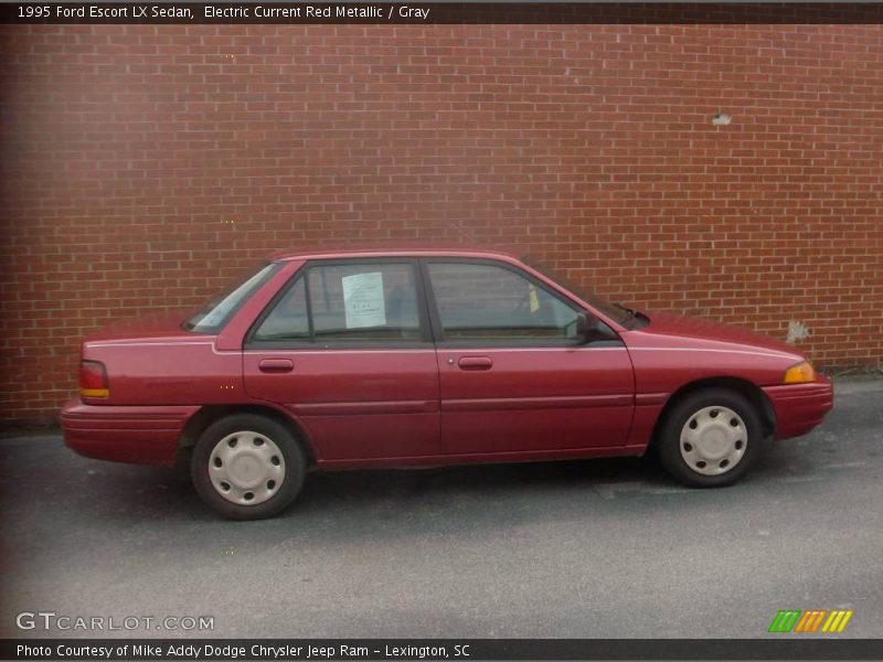 Electric Current Red Metallic / Gray 1995 Ford Escort LX Sedan