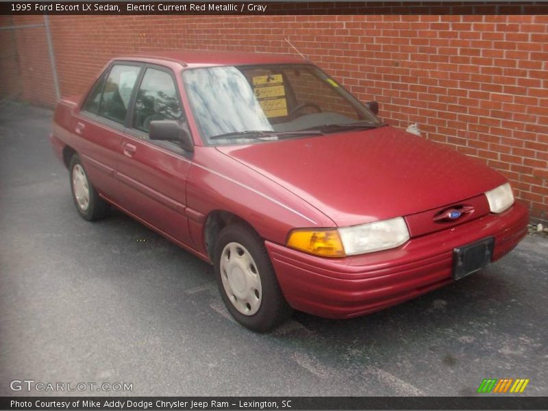 Electric Current Red Metallic / Gray 1995 Ford Escort LX Sedan