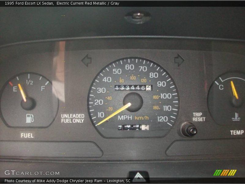 Electric Current Red Metallic / Gray 1995 Ford Escort LX Sedan