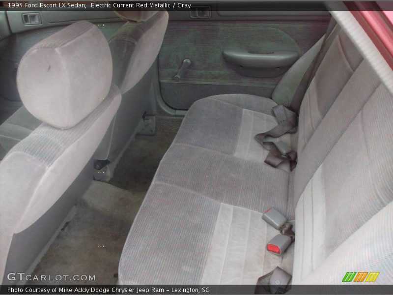 Electric Current Red Metallic / Gray 1995 Ford Escort LX Sedan