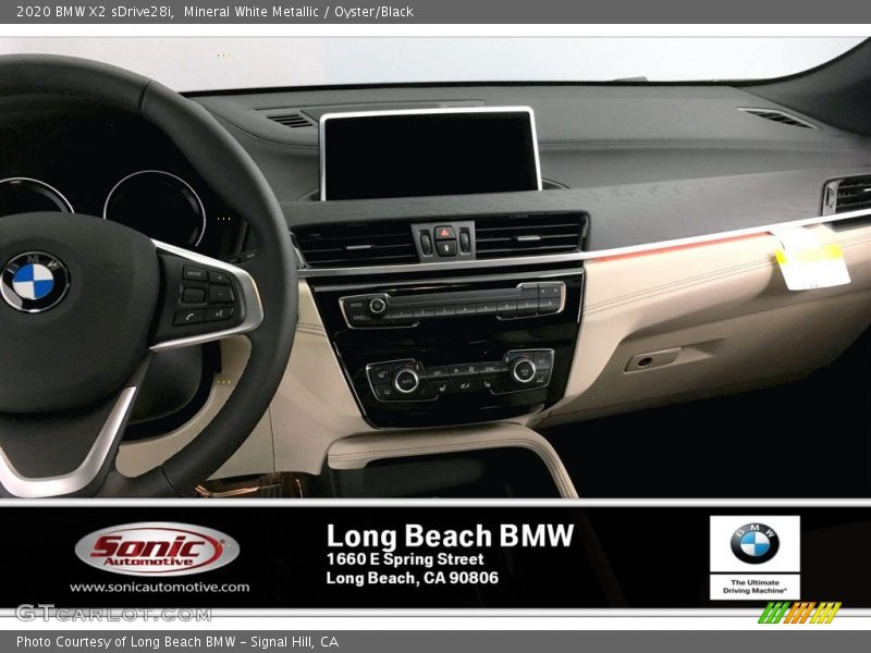 Mineral White Metallic / Oyster/Black 2020 BMW X2 sDrive28i