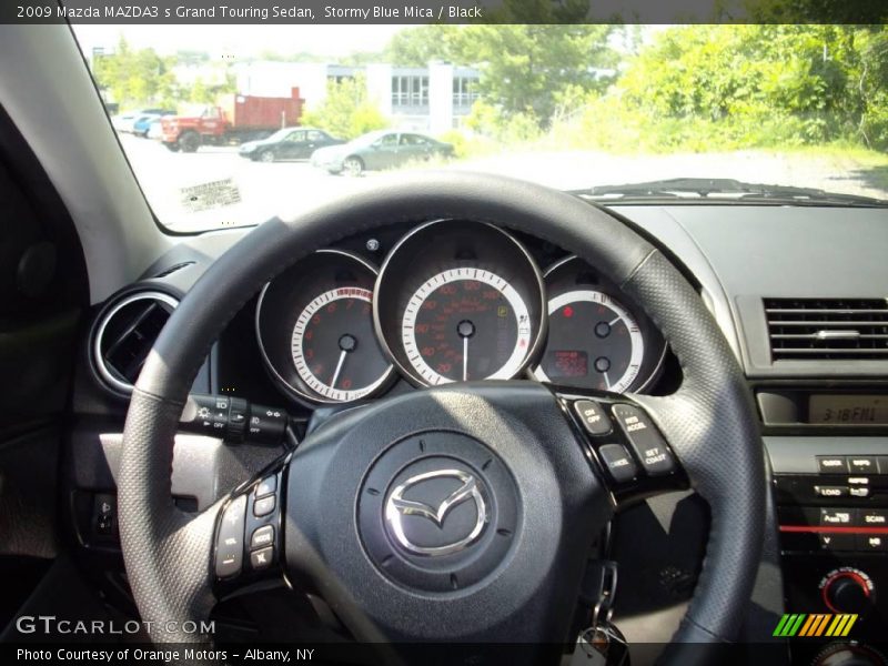 Stormy Blue Mica / Black 2009 Mazda MAZDA3 s Grand Touring Sedan