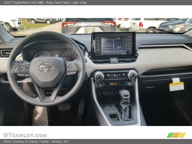 Ruby Flare Pearl / Light Gray 2020 Toyota RAV4 XLE AWD