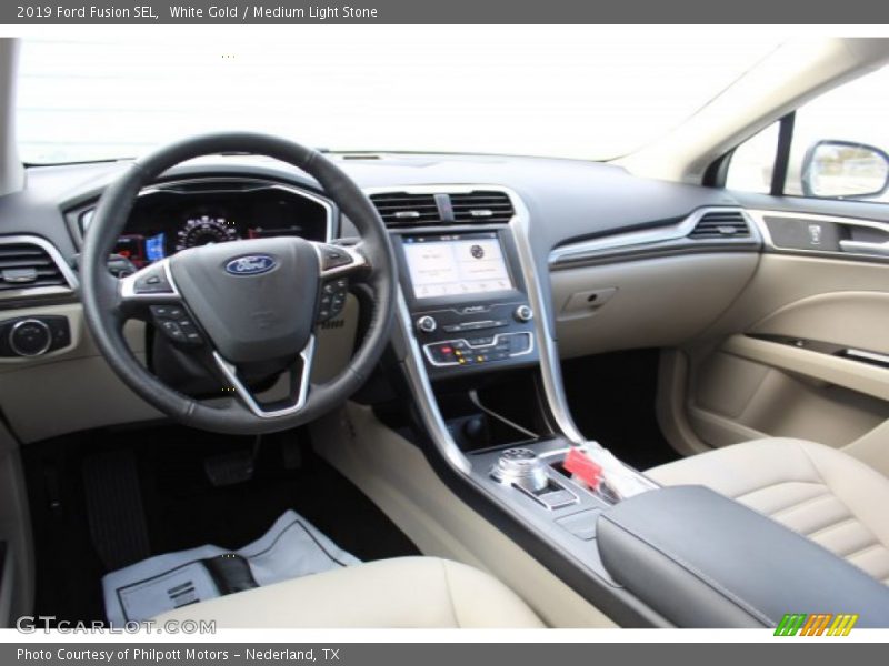 White Gold / Medium Light Stone 2019 Ford Fusion SEL