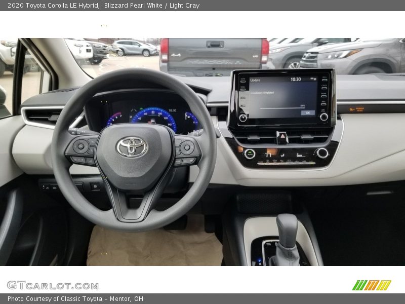 Blizzard Pearl White / Light Gray 2020 Toyota Corolla LE Hybrid