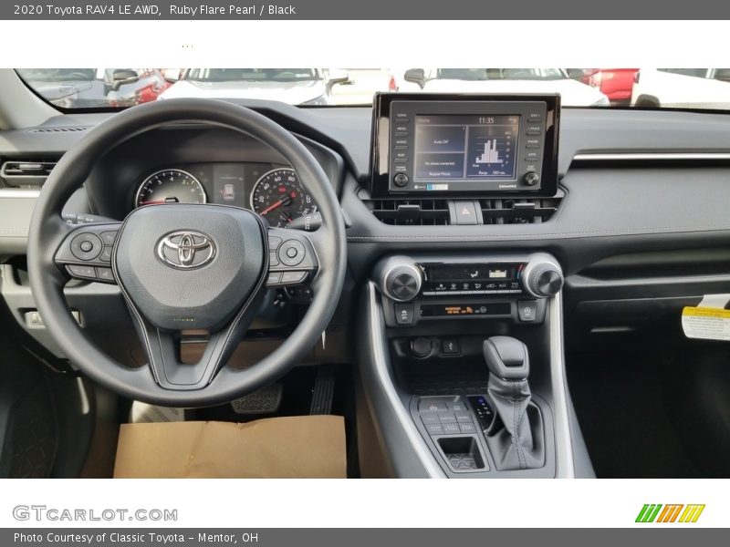 Ruby Flare Pearl / Black 2020 Toyota RAV4 LE AWD