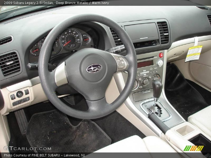 Deep Bronze Metallic / Warm Ivory 2009 Subaru Legacy 2.5i Sedan