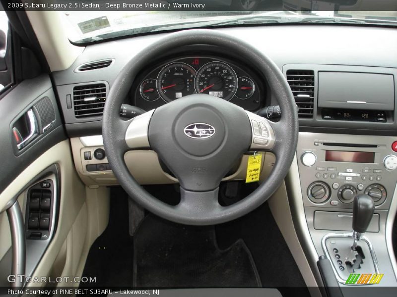 Deep Bronze Metallic / Warm Ivory 2009 Subaru Legacy 2.5i Sedan