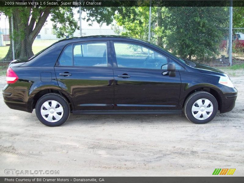 Super Black / Charcoal 2009 Nissan Versa 1.6 Sedan