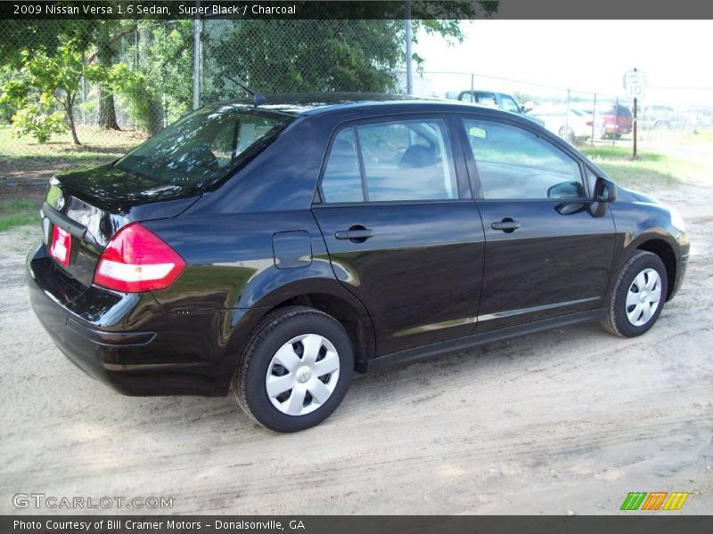 Super Black / Charcoal 2009 Nissan Versa 1.6 Sedan