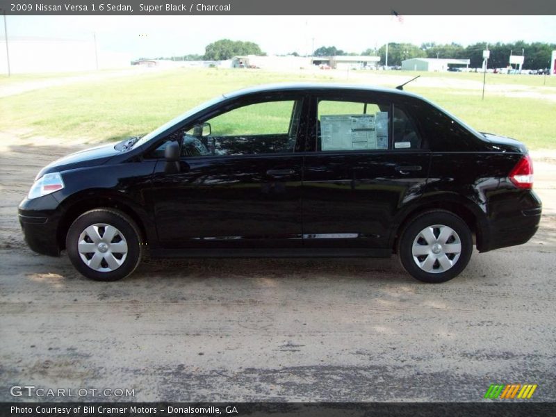 Super Black / Charcoal 2009 Nissan Versa 1.6 Sedan