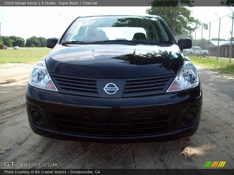 Super Black / Charcoal 2009 Nissan Versa 1.6 Sedan