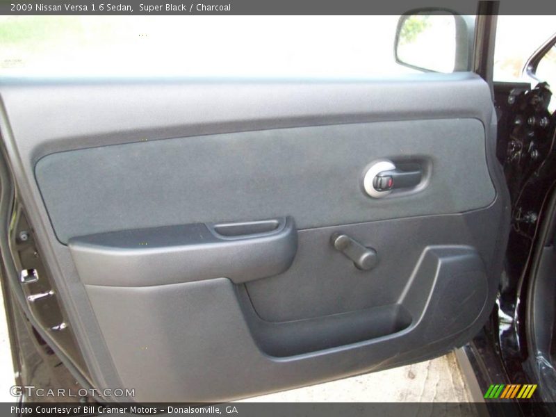 Super Black / Charcoal 2009 Nissan Versa 1.6 Sedan