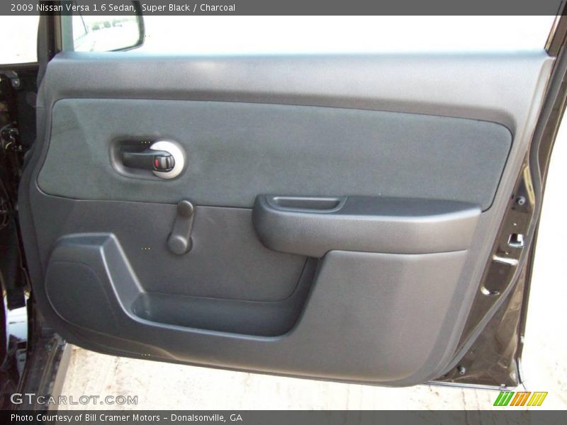 Super Black / Charcoal 2009 Nissan Versa 1.6 Sedan