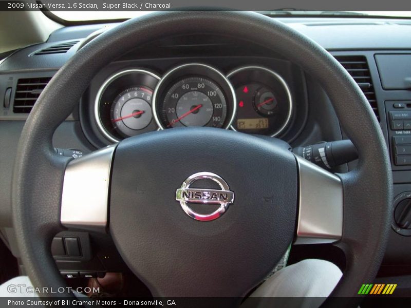 Super Black / Charcoal 2009 Nissan Versa 1.6 Sedan