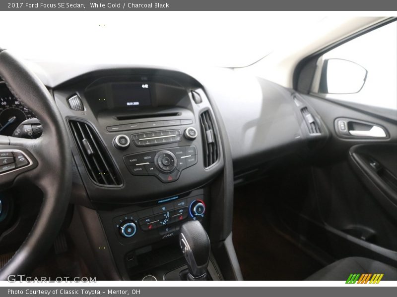 White Gold / Charcoal Black 2017 Ford Focus SE Sedan