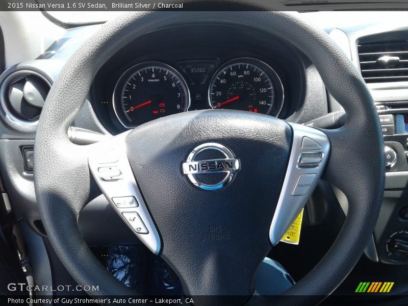 Brilliant Silver / Charcoal 2015 Nissan Versa 1.6 SV Sedan