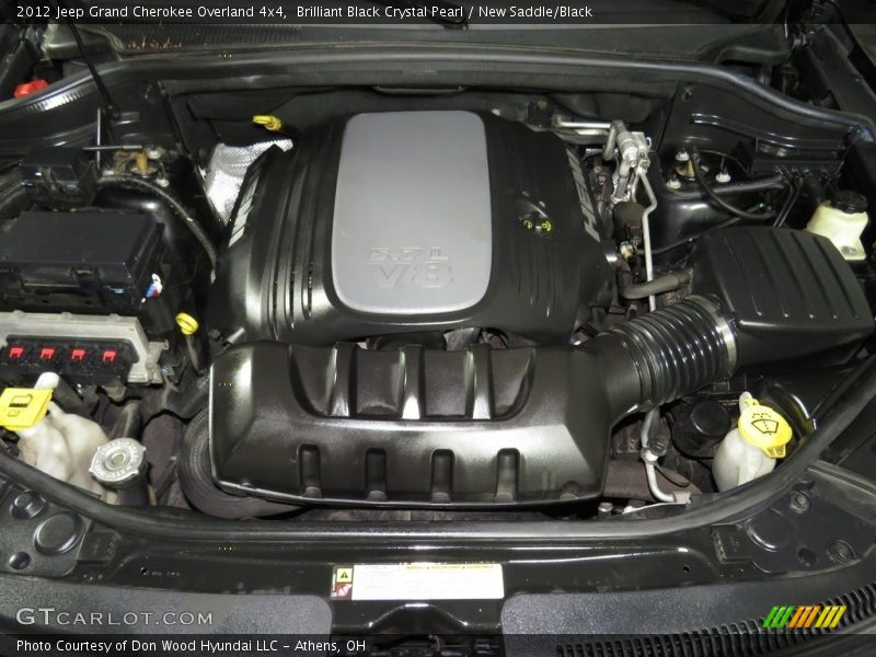 Brilliant Black Crystal Pearl / New Saddle/Black 2012 Jeep Grand Cherokee Overland 4x4