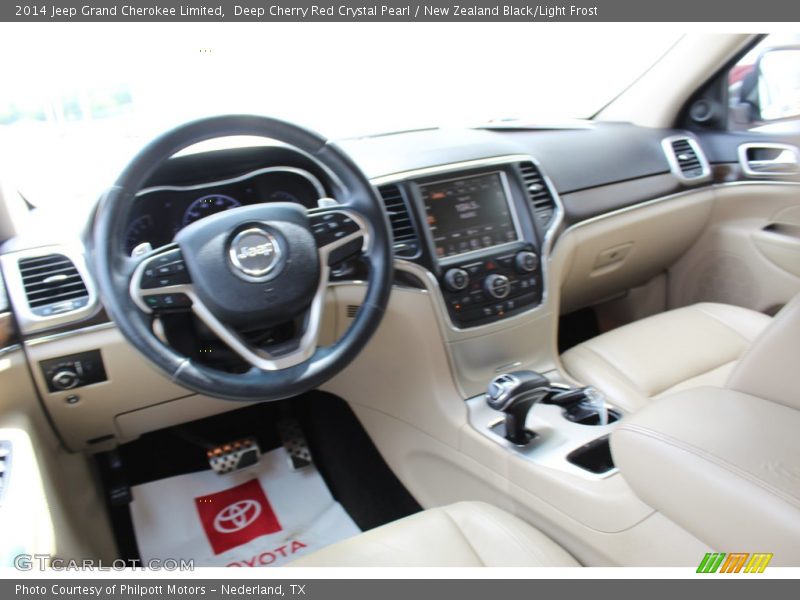 Deep Cherry Red Crystal Pearl / New Zealand Black/Light Frost 2014 Jeep Grand Cherokee Limited
