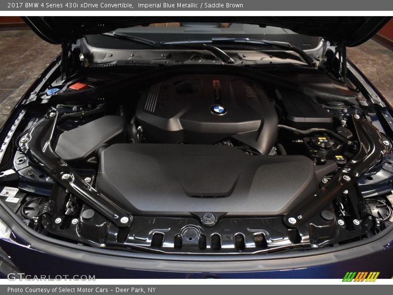 Imperial Blue Metallic / Saddle Brown 2017 BMW 4 Series 430i xDrive Convertible