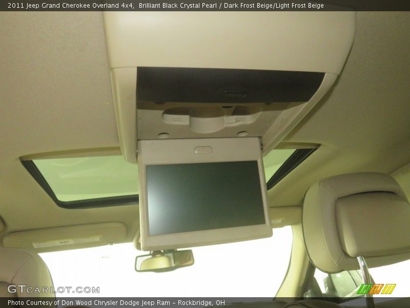 Brilliant Black Crystal Pearl / Dark Frost Beige/Light Frost Beige 2011 Jeep Grand Cherokee Overland 4x4