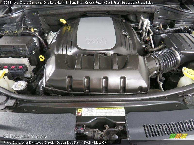 Brilliant Black Crystal Pearl / Dark Frost Beige/Light Frost Beige 2011 Jeep Grand Cherokee Overland 4x4