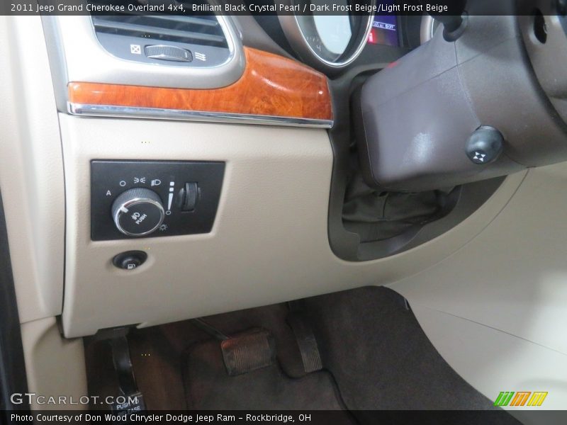 Brilliant Black Crystal Pearl / Dark Frost Beige/Light Frost Beige 2011 Jeep Grand Cherokee Overland 4x4