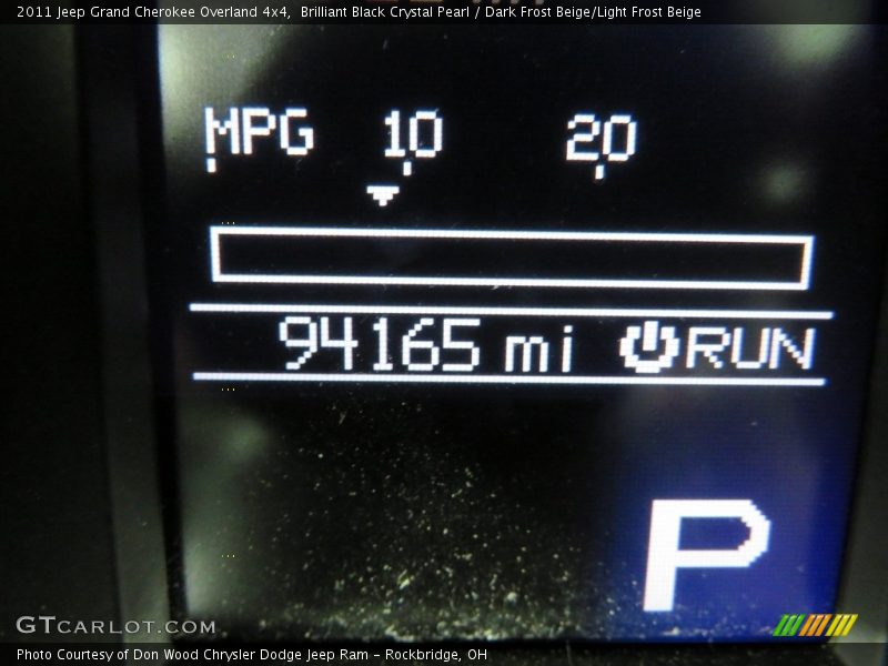 Brilliant Black Crystal Pearl / Dark Frost Beige/Light Frost Beige 2011 Jeep Grand Cherokee Overland 4x4