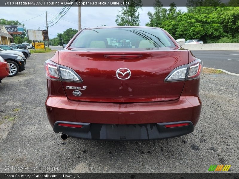 Copper Red Mica / Dune Beige 2010 Mazda MAZDA3 i Touring 4 Door