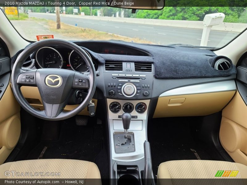 Copper Red Mica / Dune Beige 2010 Mazda MAZDA3 i Touring 4 Door