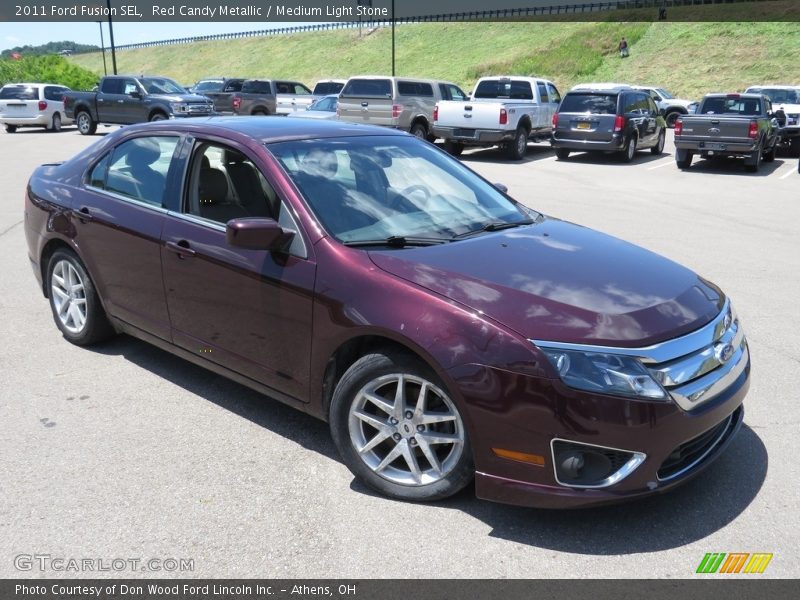 Red Candy Metallic / Medium Light Stone 2011 Ford Fusion SEL