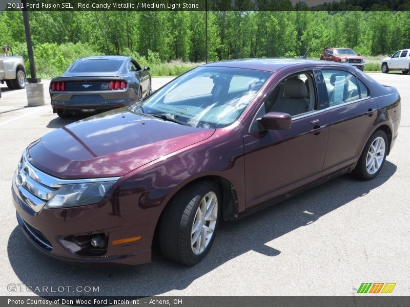 Red Candy Metallic / Medium Light Stone 2011 Ford Fusion SEL